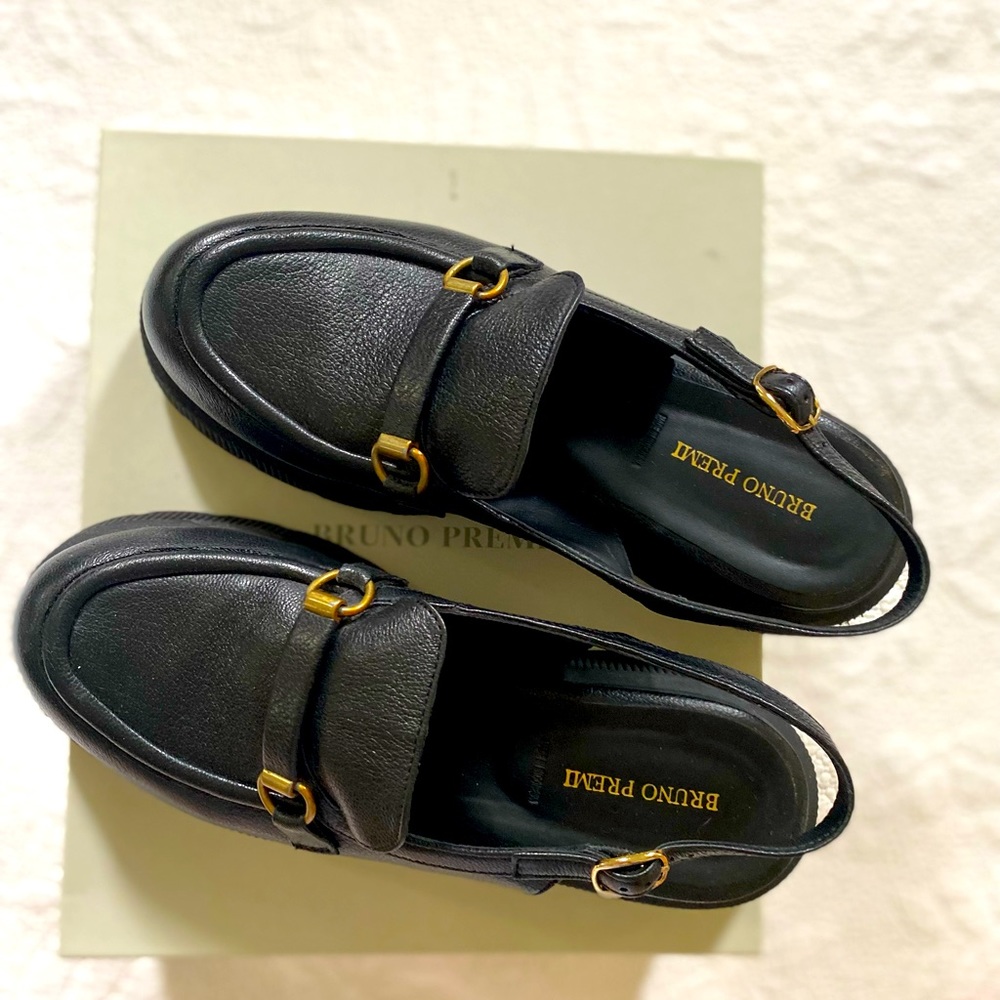 Black chunky Anthropologie slingback.